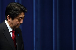 Abe fails to shake firms’ addiction to cash