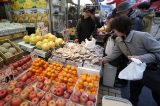 Abe declares end of deflation