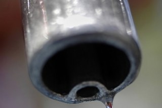 IEA cuts oil forecast, says prices could fall further