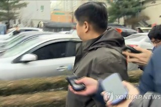 Police officer’s home and office raided in presidential documents probe