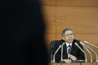 BOJ cuts inflation outlook, maintains record stimulus