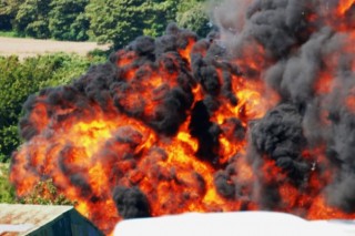 Police say 7 dead after jet in UK airshow crashes into road