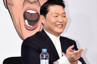 Long-awaited Psy album sweeps local music charts
