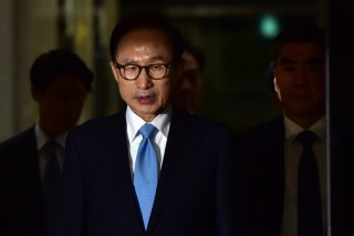 Ex-President Lee admits to receiving illicit money from state spy agency