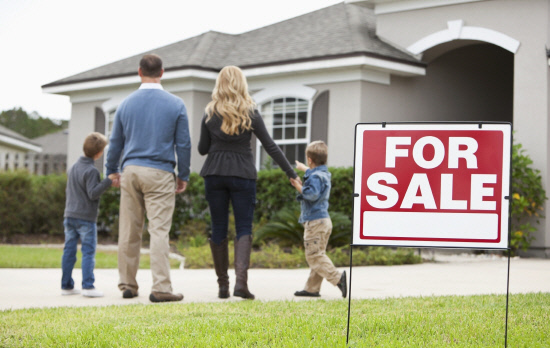 Family looking at house for sale