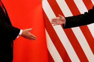 FILE PHOTO: FILE PHOTO: U.S. President Donald Trump and China's President Xi Jinping shake hands after making joint statements at the Great Hall of the People in Beijing