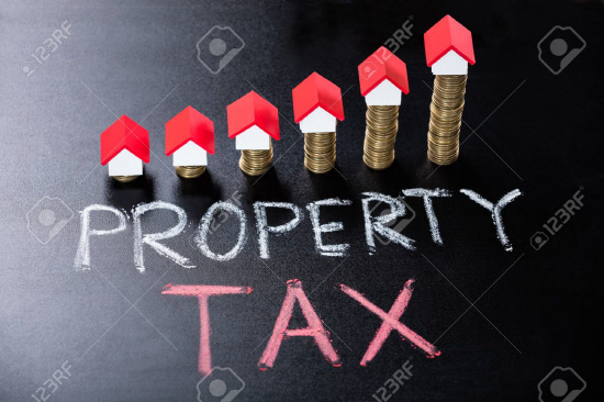 Property Tax Concept On Blackboard