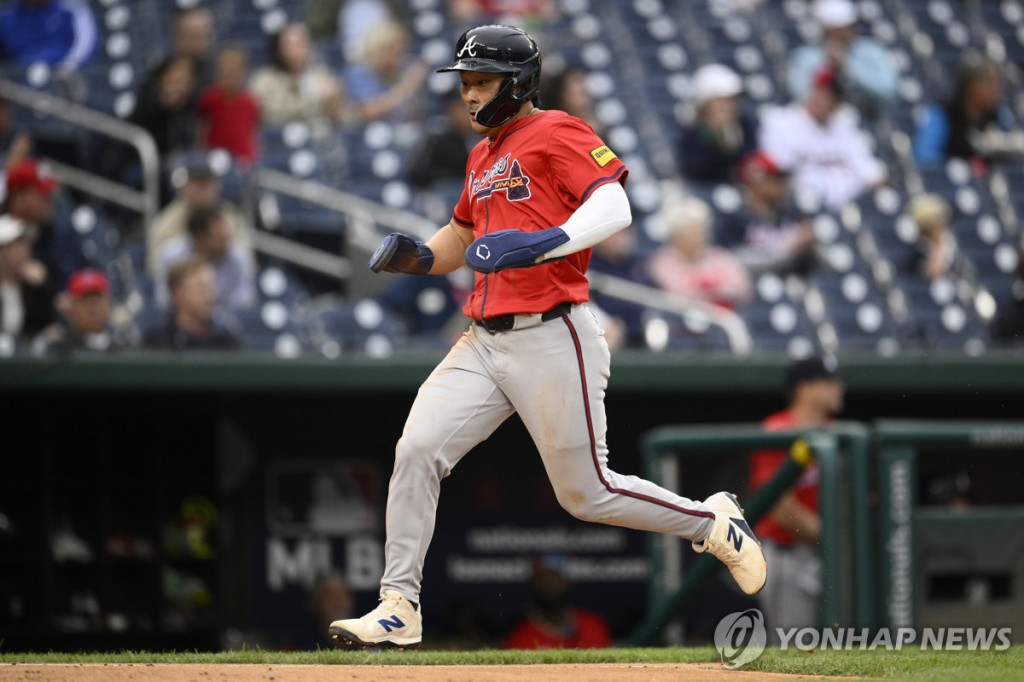 홈으로 내달리는 김하성 [AP=연합]