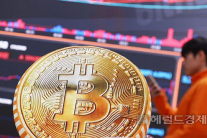 비트코인 15개월만 최저치…한때 7만달러선 붕괴