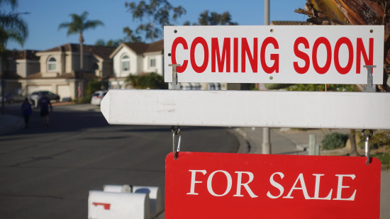 A 'Coming Soon - For Sale' sign