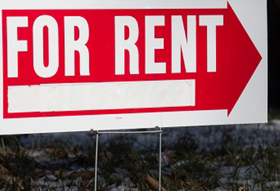 For Rent sign in front of a home